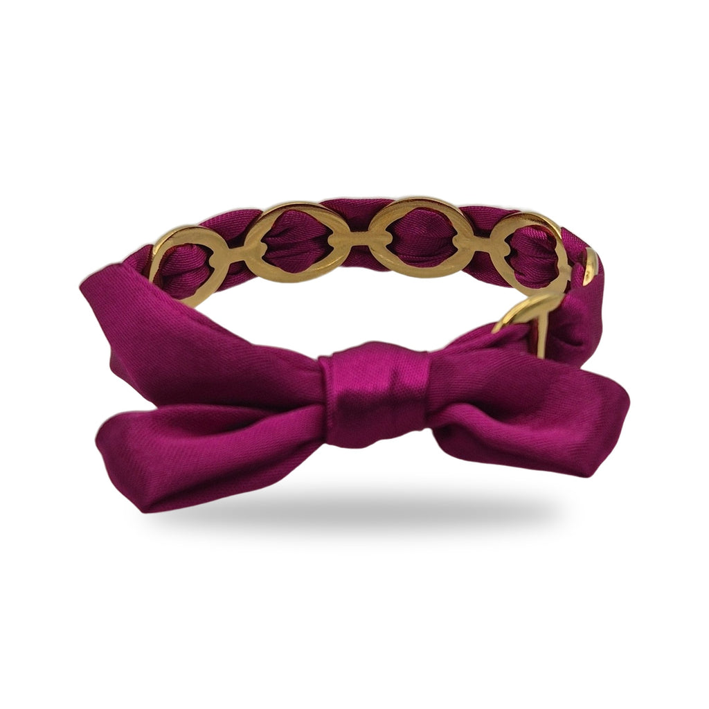 Bracelet ruban noué fuchsia maillons dorés