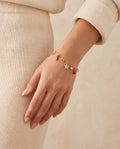 Bracelet porte-bonheur piment rouge doré porté