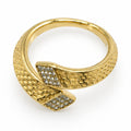 Bague ouverte deux têtes pavées dorée