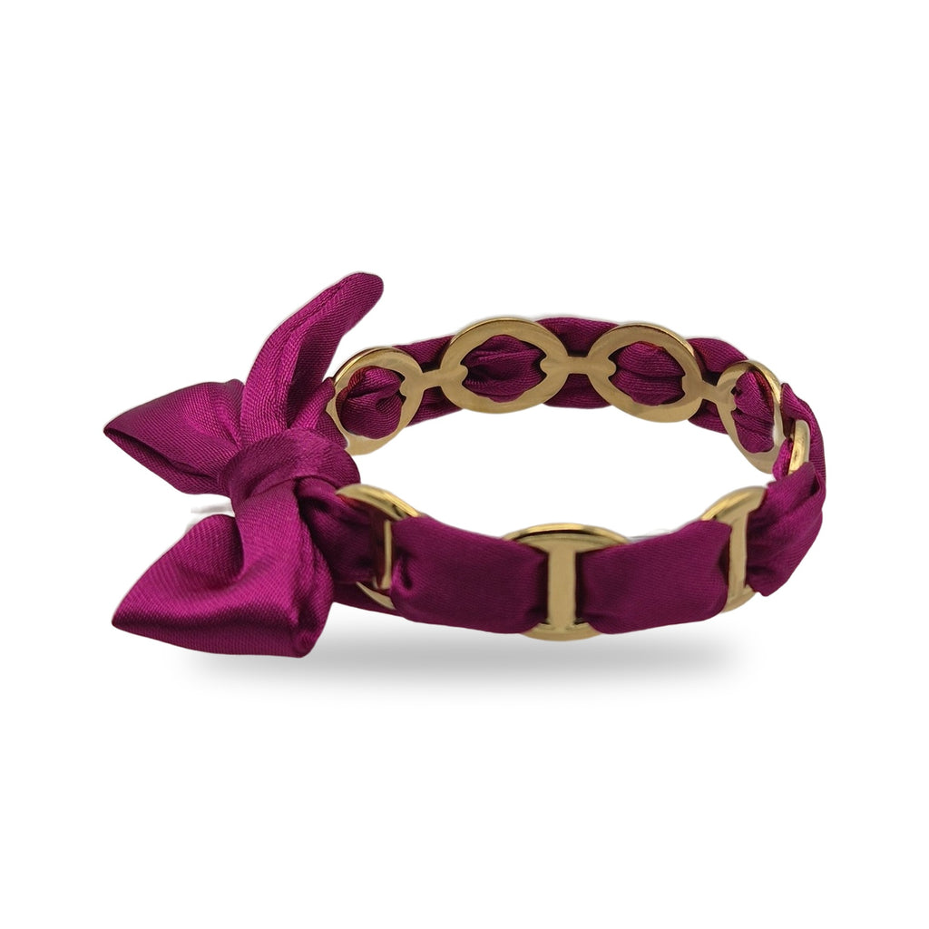 Bracelet ruban noué fuchsia, vue de profil
