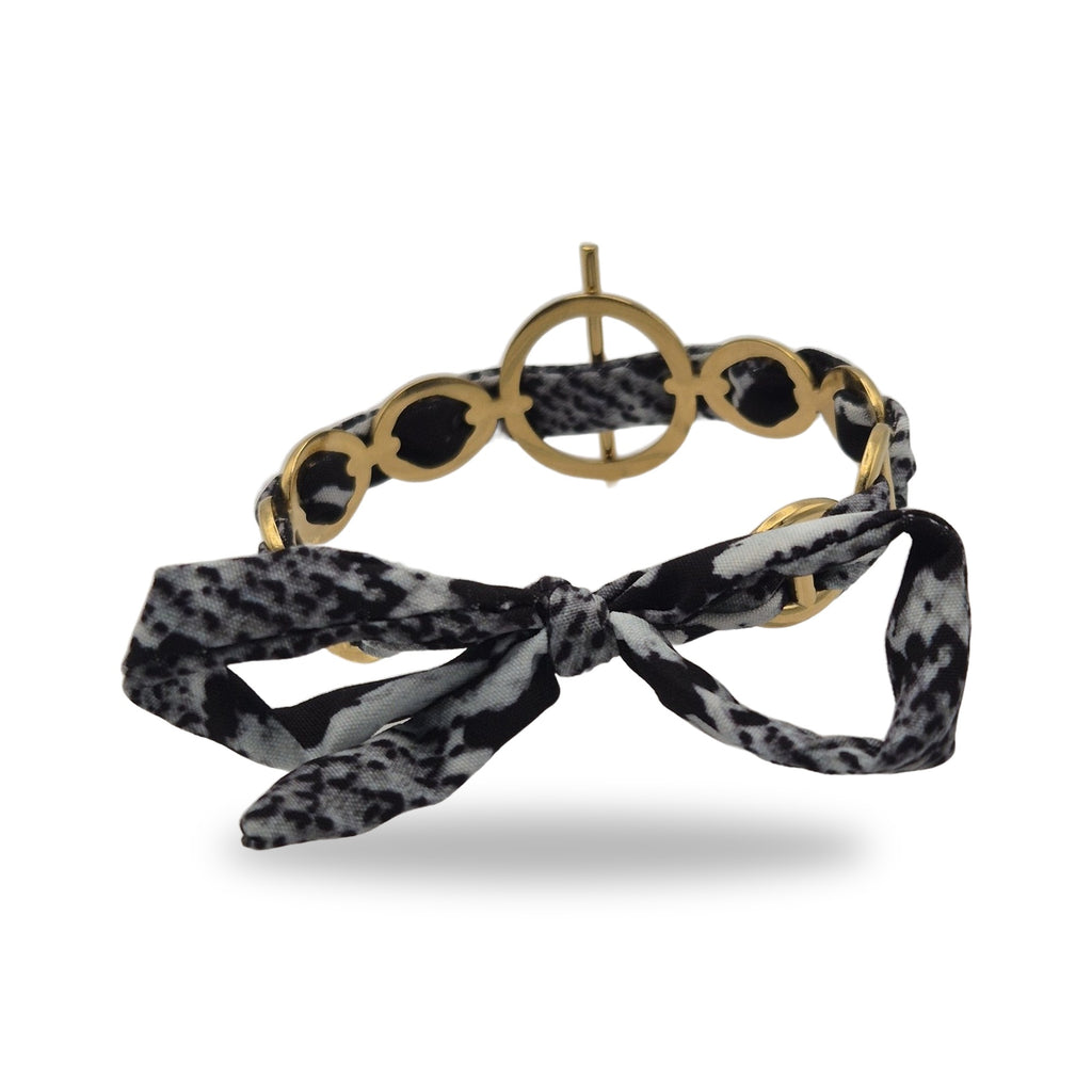 Bracelet ruban imprimé serpent fermoir barre doré