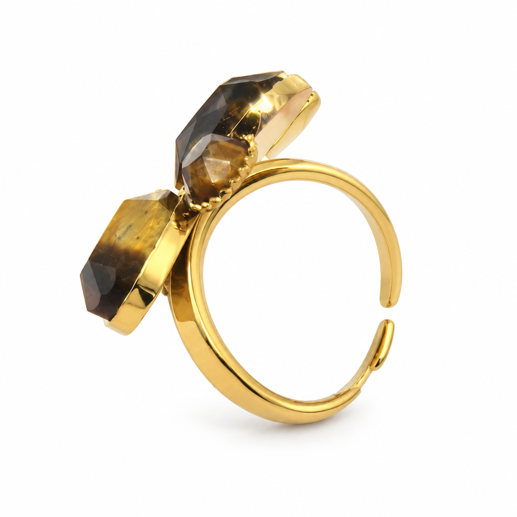 Bague réglable quatre pierres facettées brun doré, vue de côté anneau ouvert